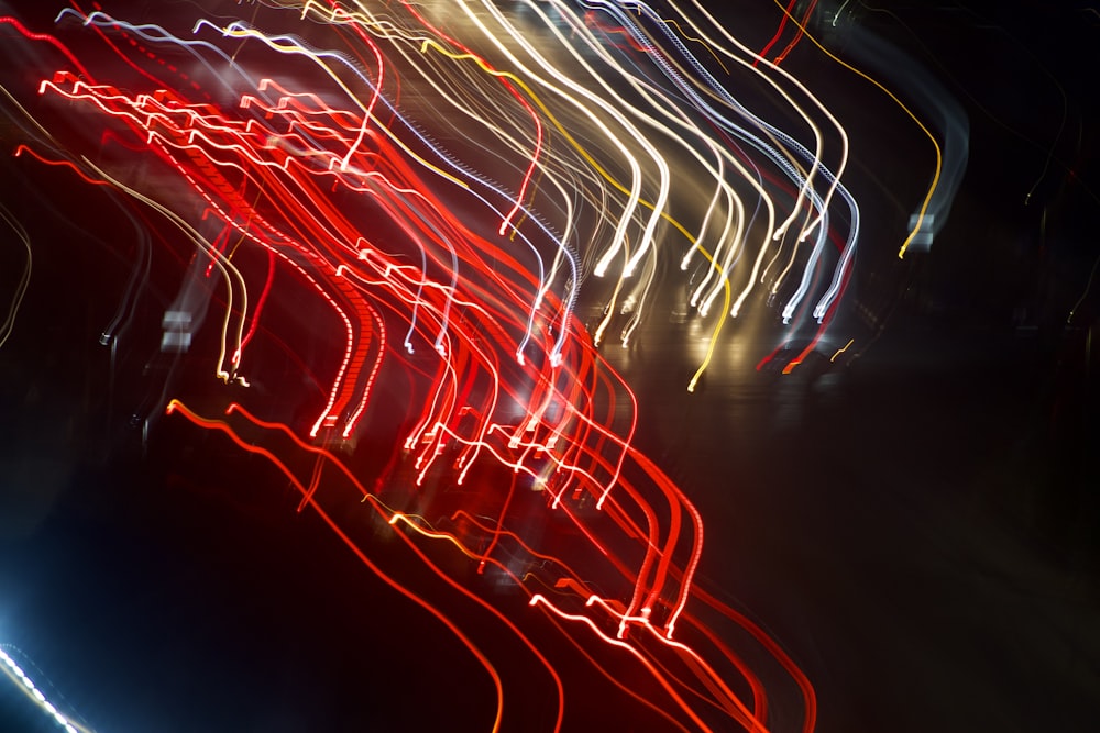 a blurry photo of a street at night