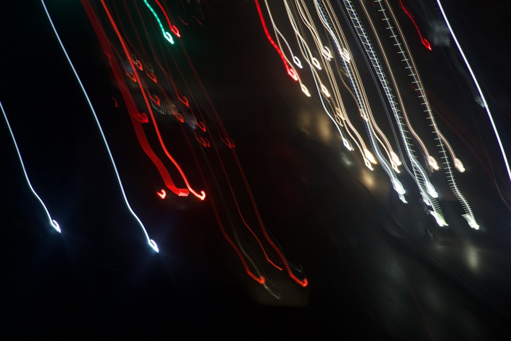 a blurry photo of a city street at night