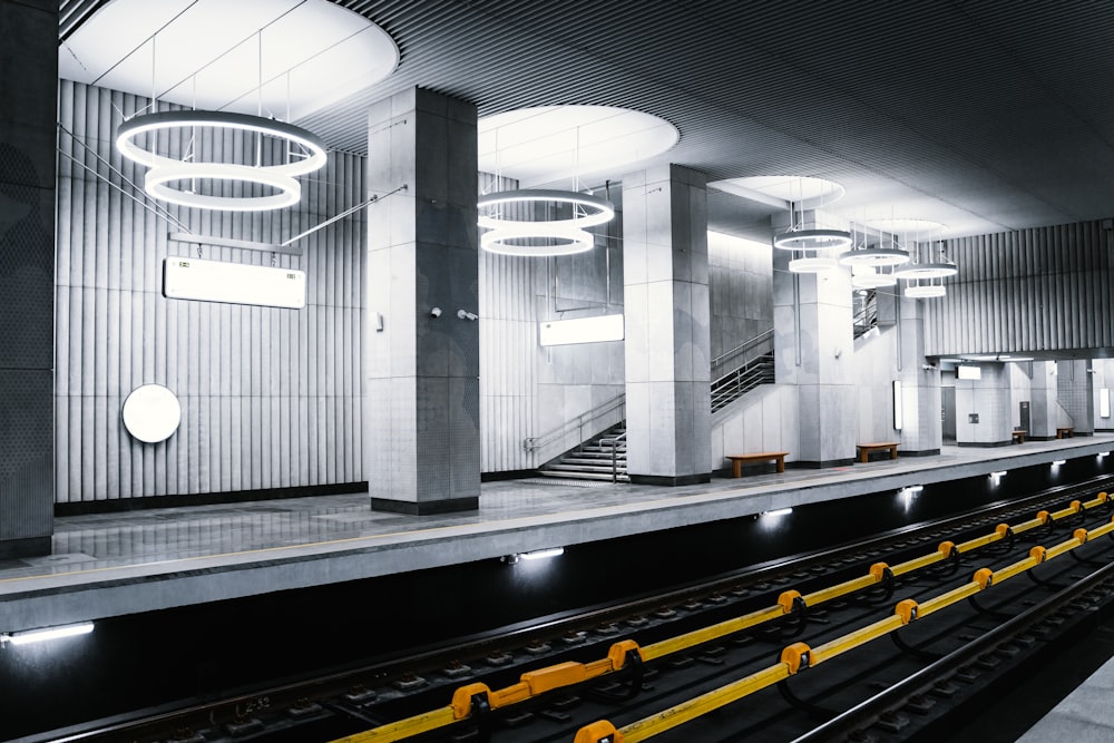 a train station with a set of train tracks