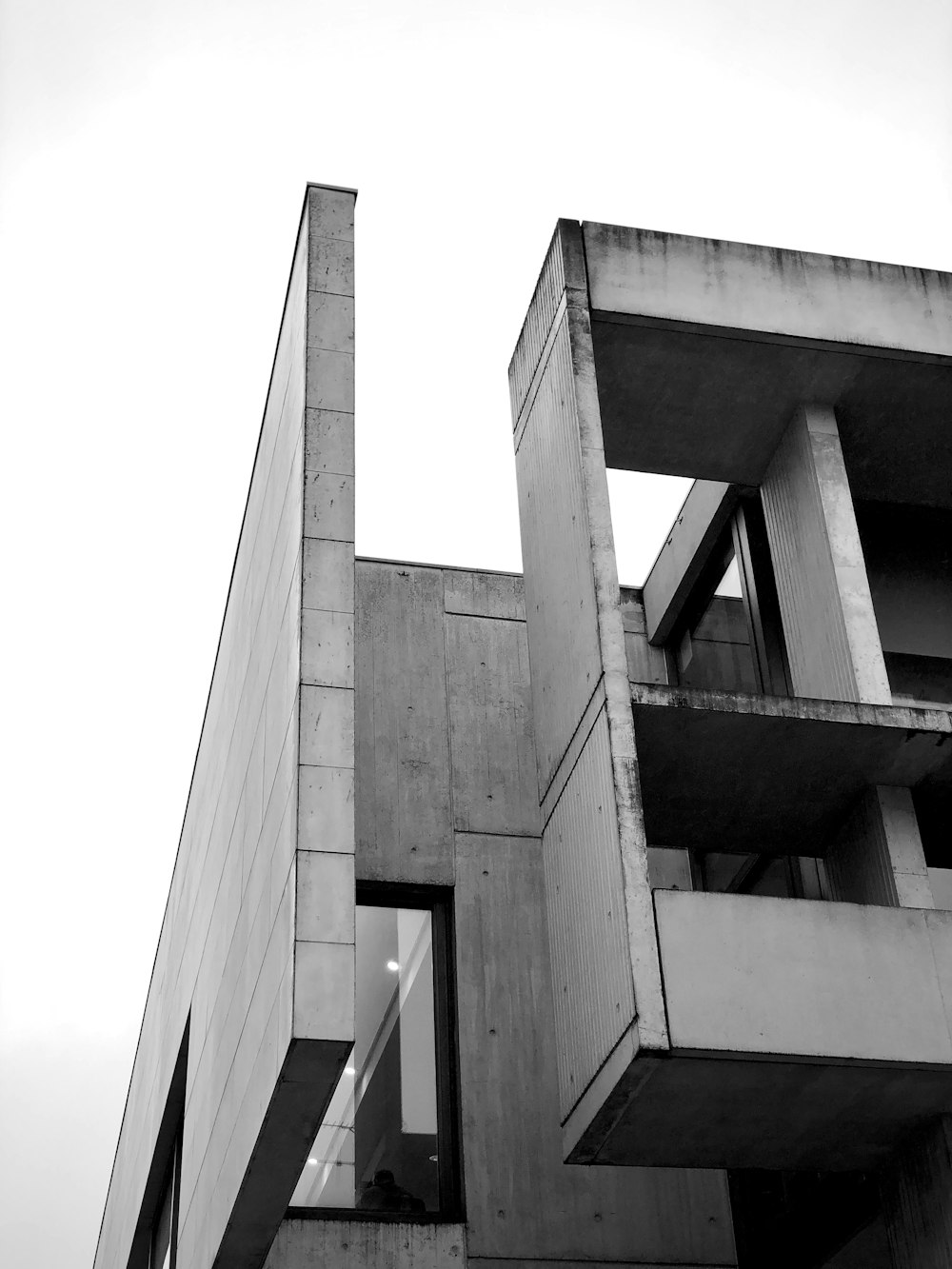 a black and white photo of a tall building