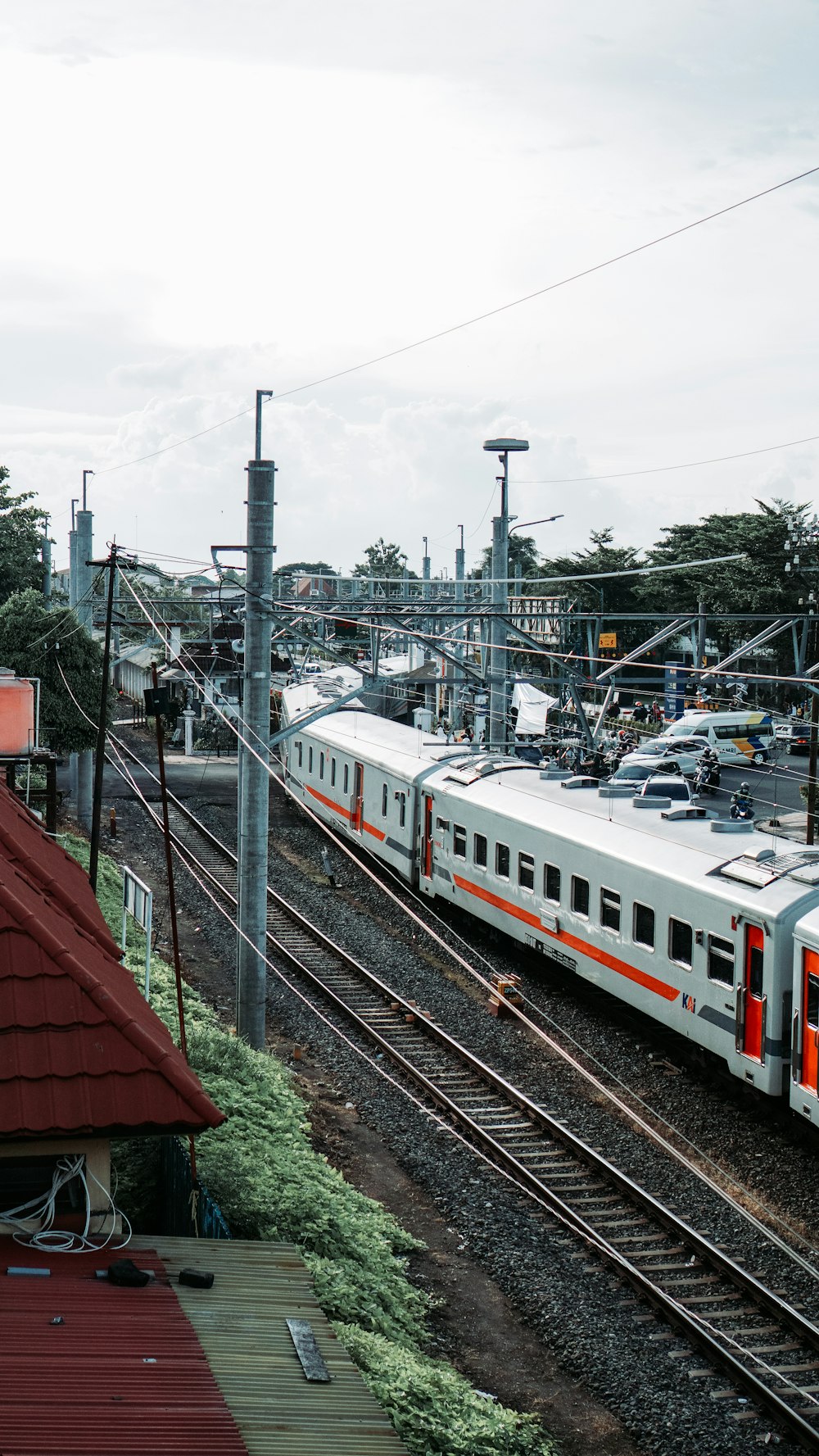 a train on a train track next to a train station