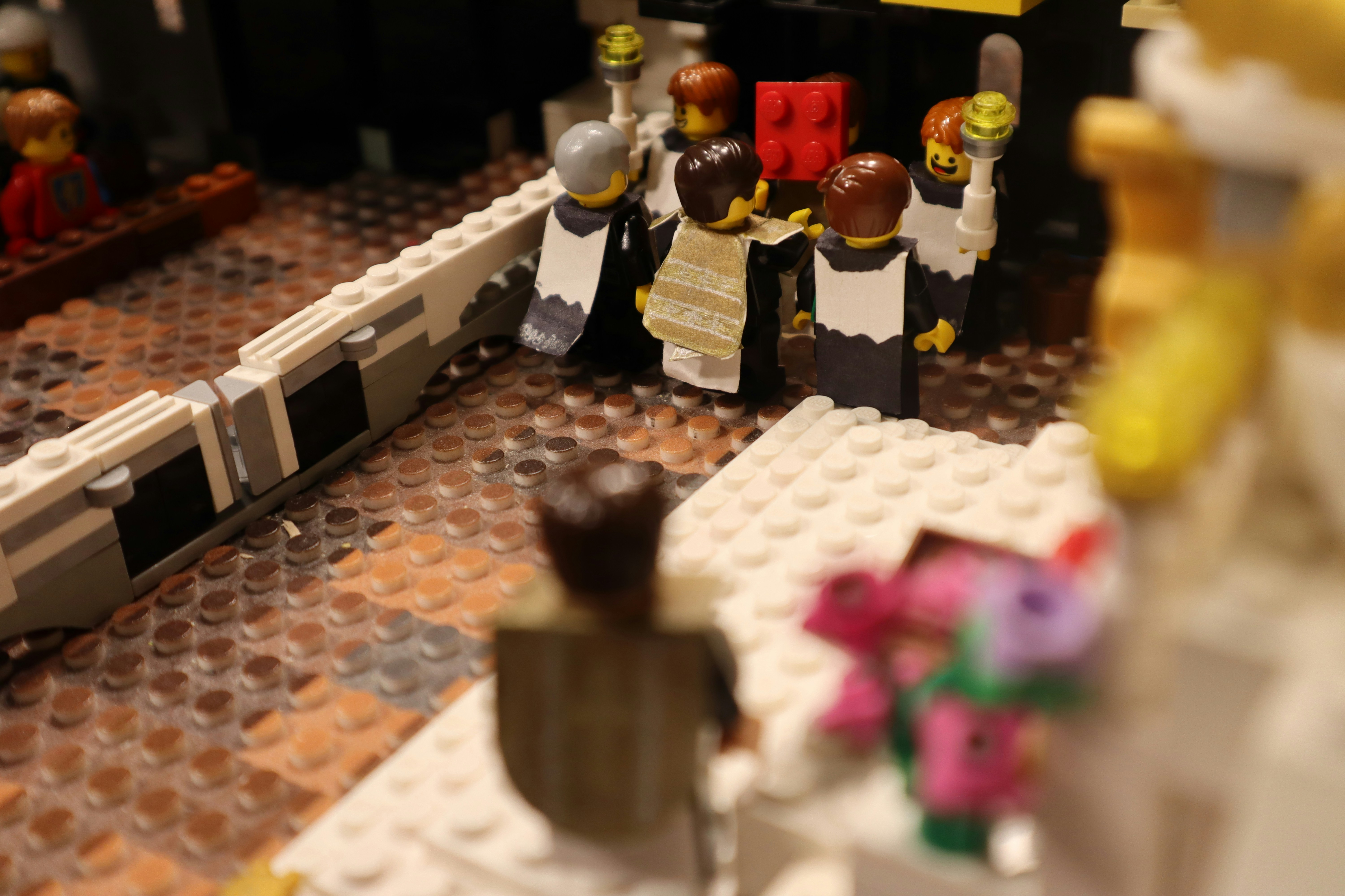 a close up of a lego model of a wedding scene