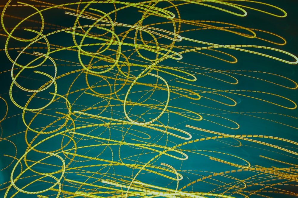 a close up of a green background with yellow lines