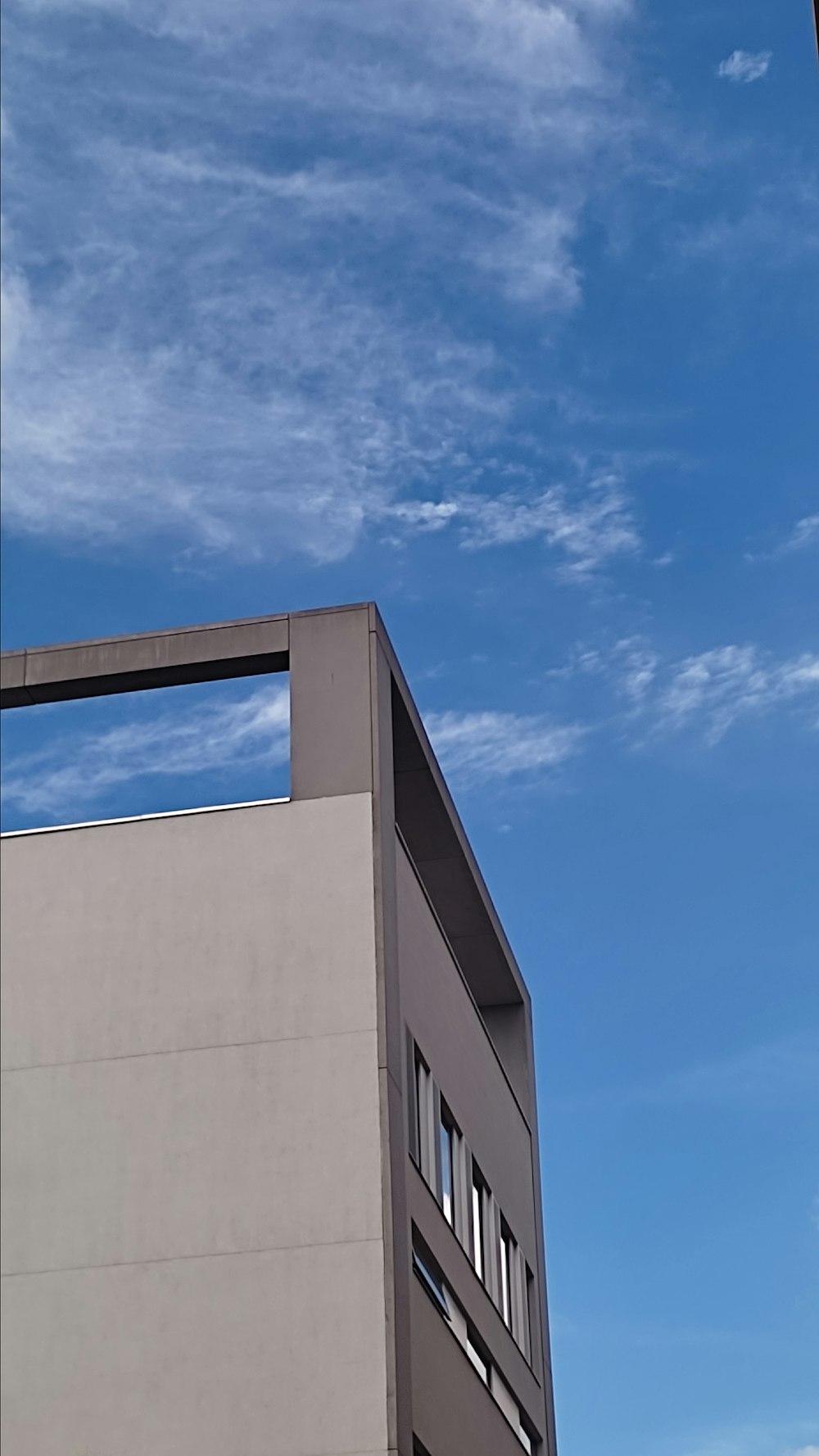 a tall building sitting next to a traffic light