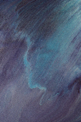 Soft blue water currents forming a calming swirl pattern, evoking healing and balance.