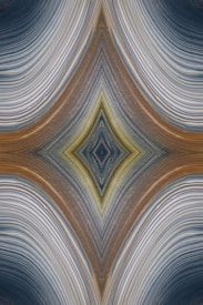 An abstract design featuring a symmetrical, kaleidoscopic pattern with curved lines converging towards a central diamond shape. The lines exhibit a variety of textures and gradients, creating an intricate visual effect reminiscent of layered fabric or natural formations.