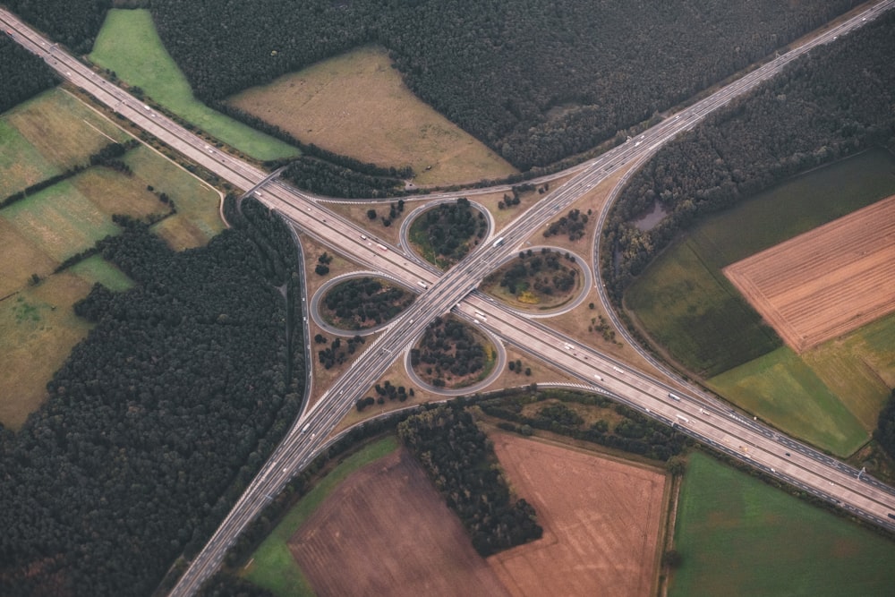 an aerial view of a highway intersection in the country