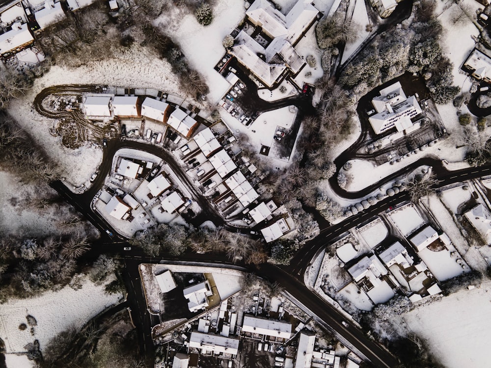 an aerial view of a snow covered city