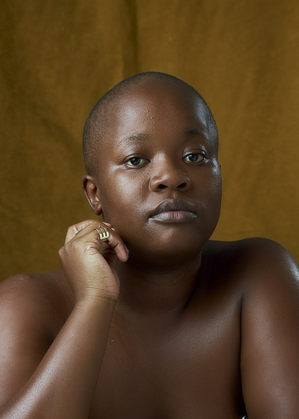 a black woman with a ring on her finger