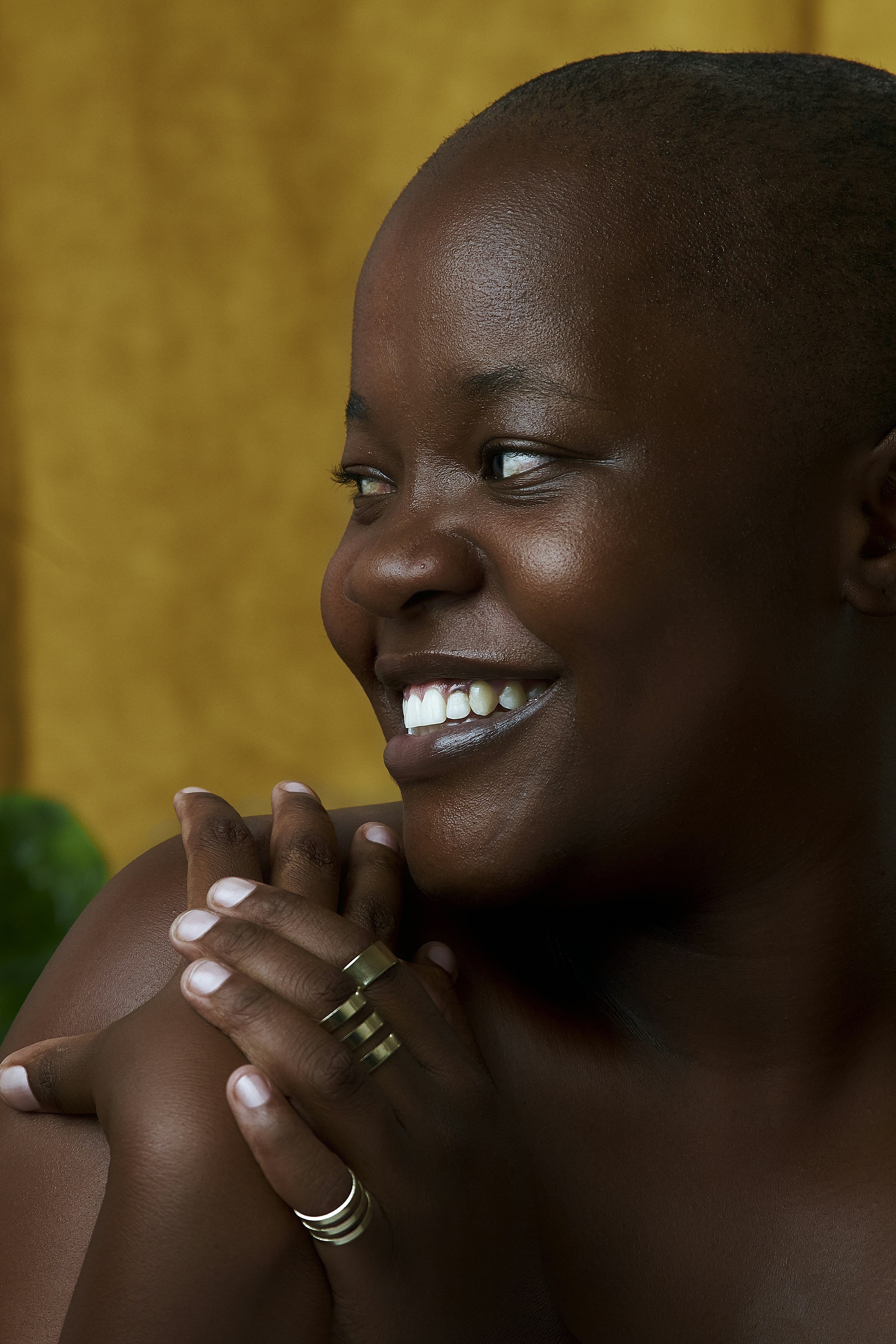 a woman with a ring on her left hand