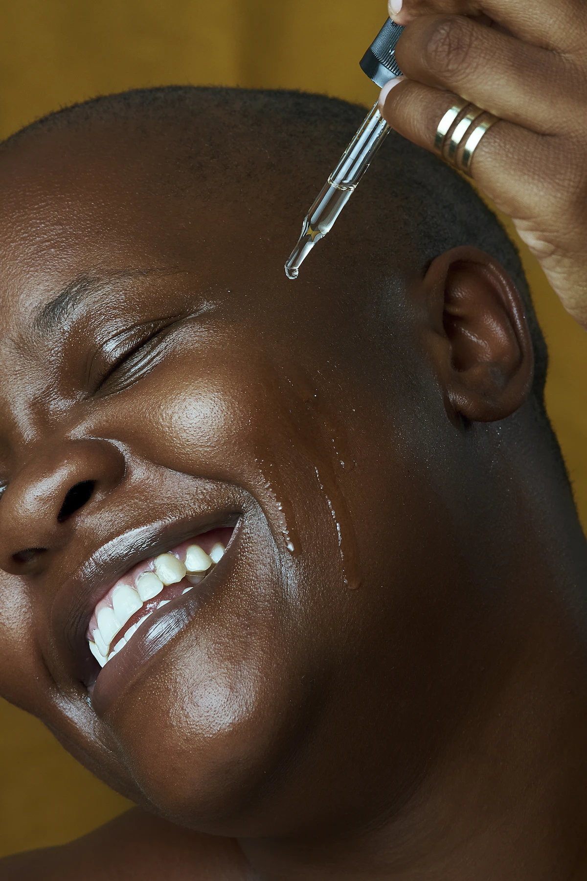 Smiling teen having her hair styled