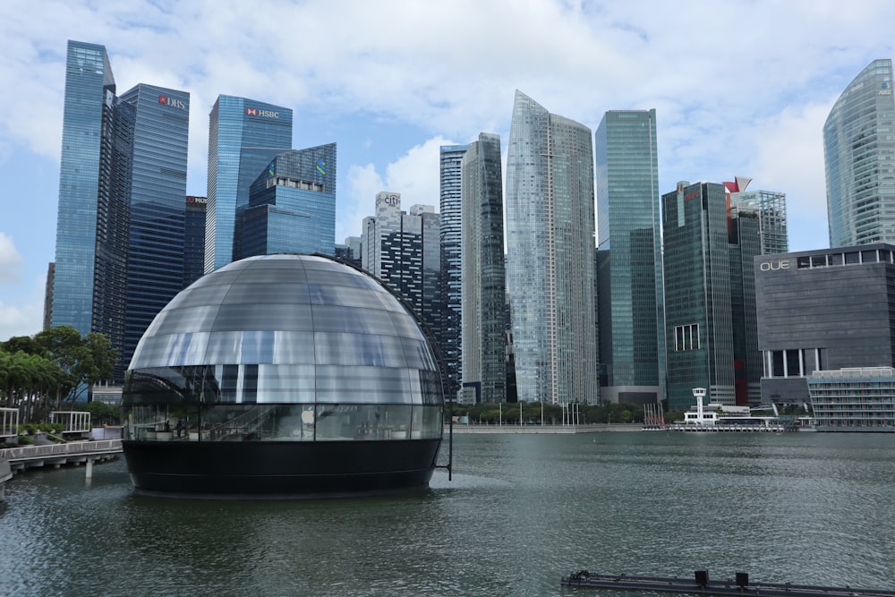 a body of water in front of a large city