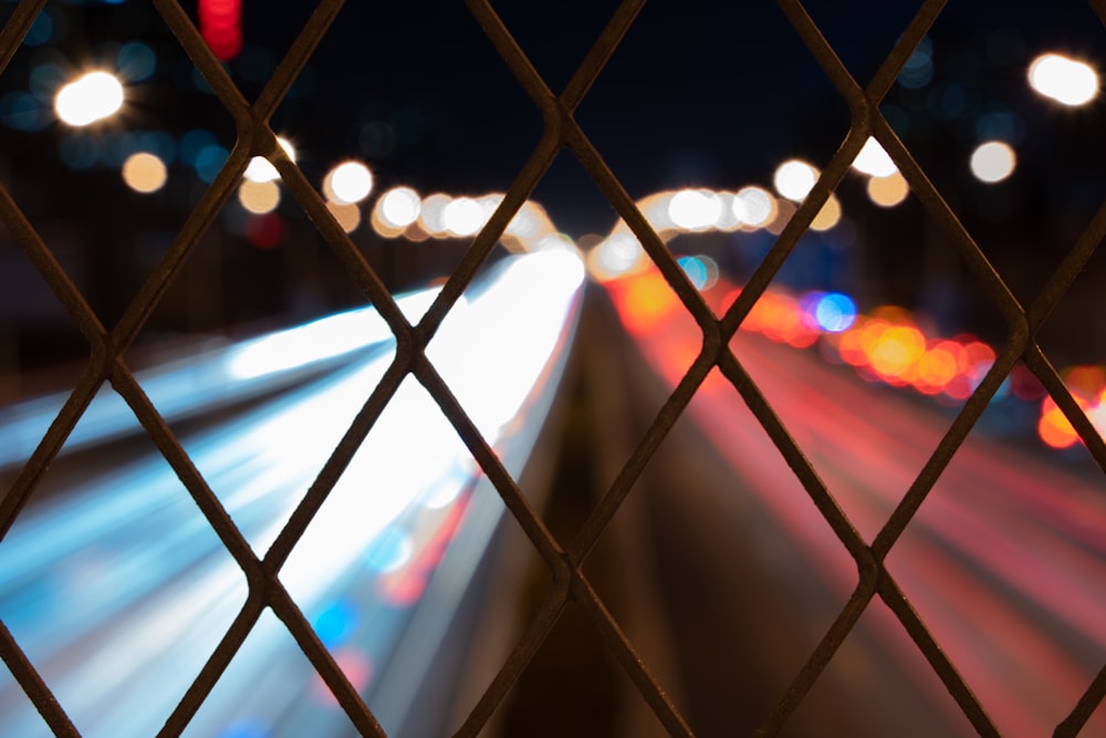 a blurry photo of a city street at night