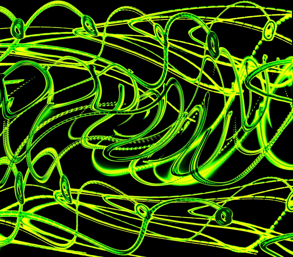 a black background with green and yellow swirls