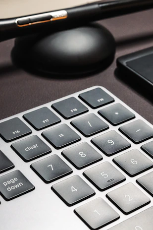 a close up of a computer keyboard and mouse