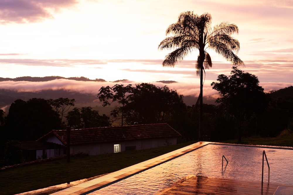 a swimming pool with a view of the mountains