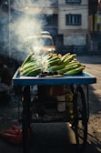 a cart with a bunch of bananas on top of it