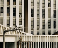 A technician installing smart sensors on a building’s security system.
