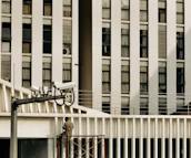 Technician installing advanced security system in a corporate building.