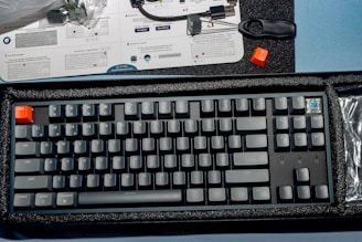 a keyboard and a mouse on a table