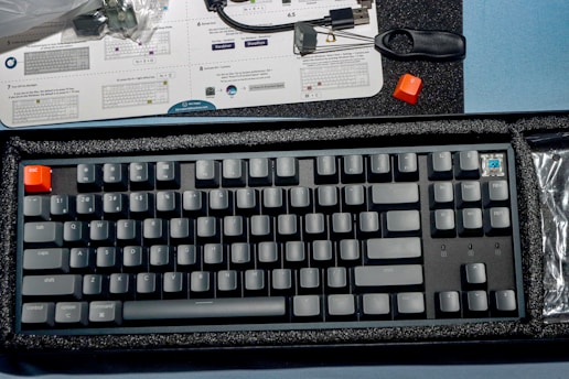 a keyboard and a mouse on a table