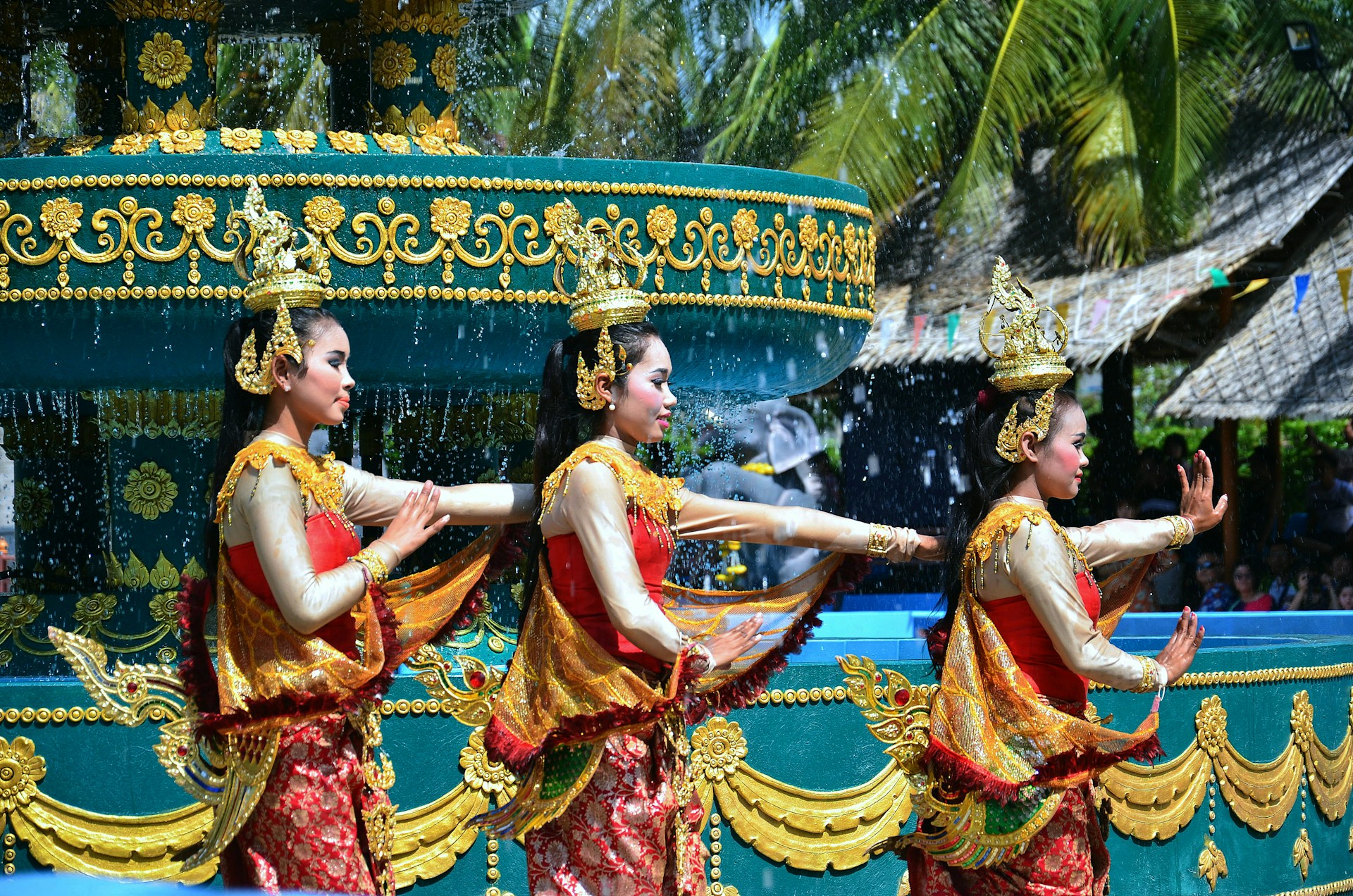a group of women in costume performing a dance