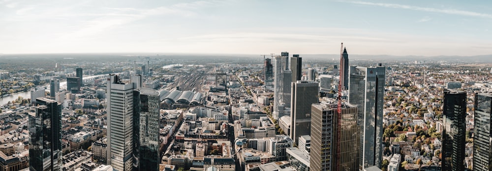 an aerial view of a city with tall buildings