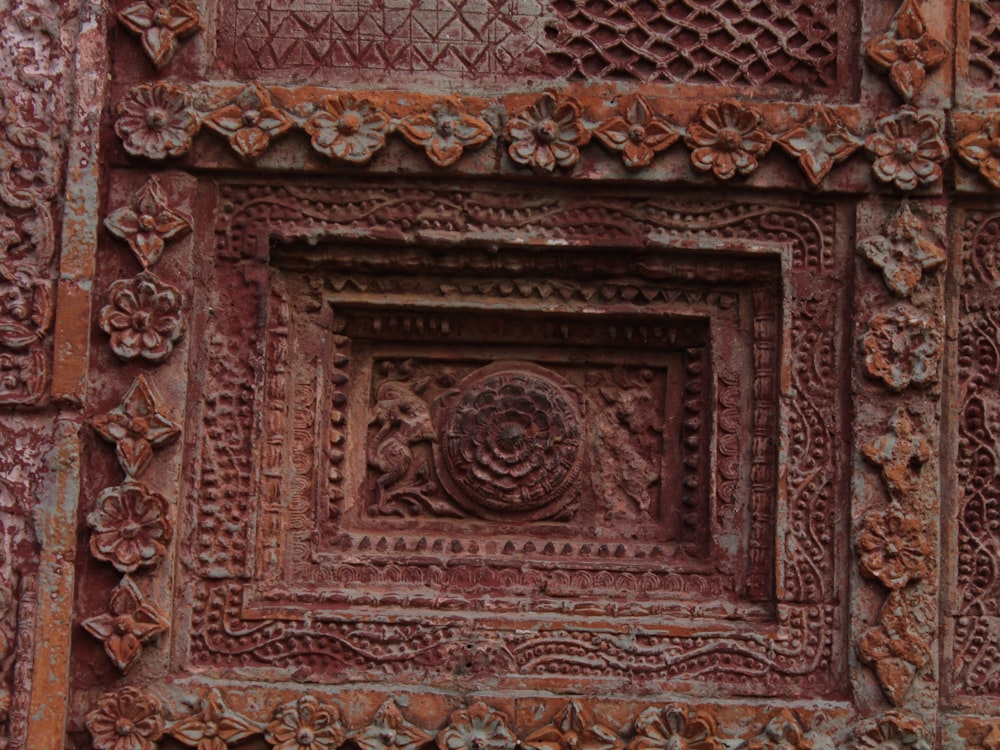 a close up of a decorative object on a wall
