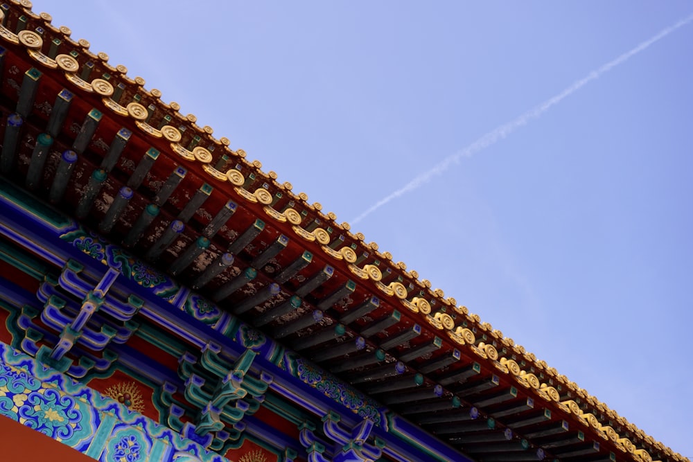 a building with a blue sky in the background