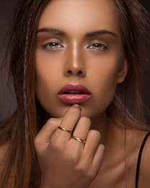 a woman with a ring on her finger