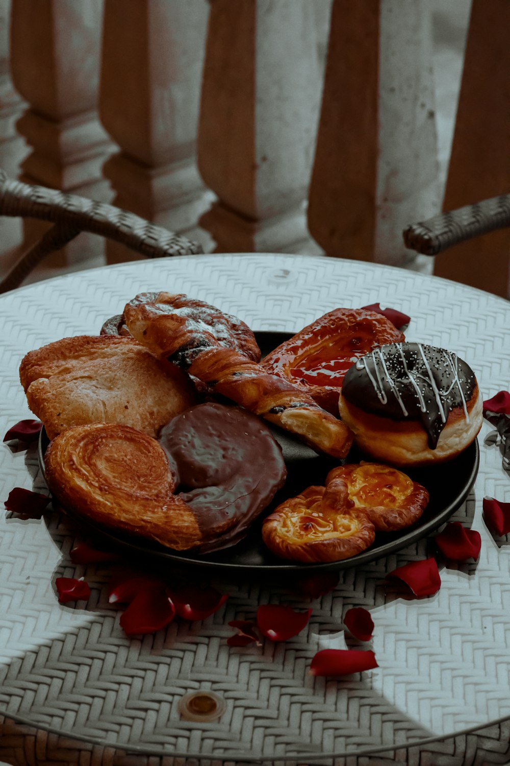 a plate of pastries and pastries on a table