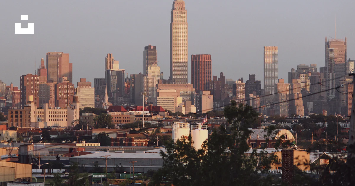 A view of a city from a distance photo – Free Building Image on Unsplash