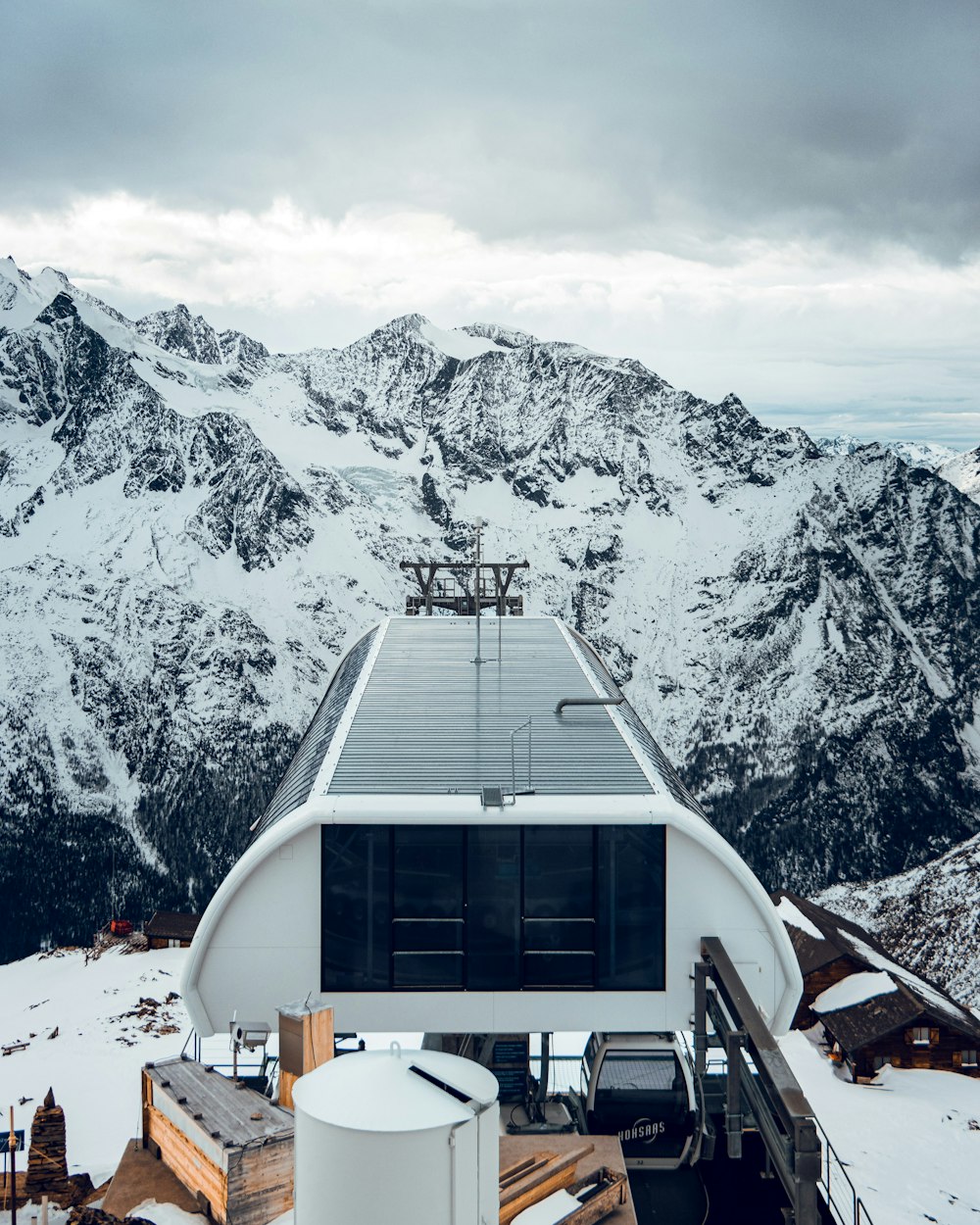 a solar panel on top of a building in the mountains