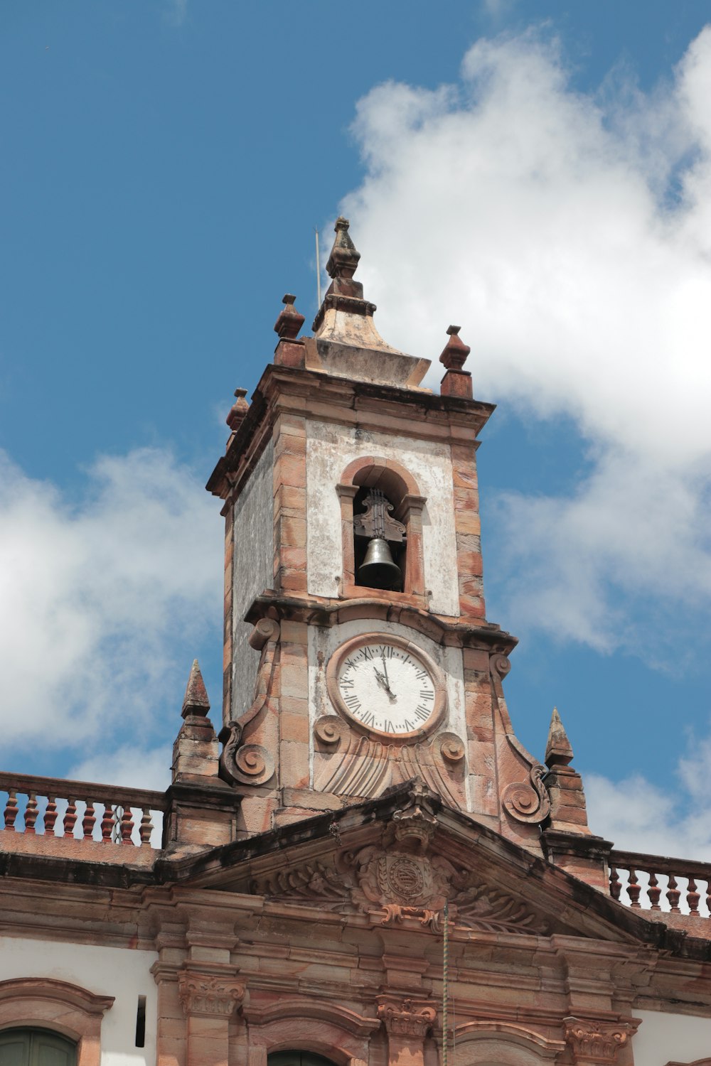 a tall clock tower with a sky background