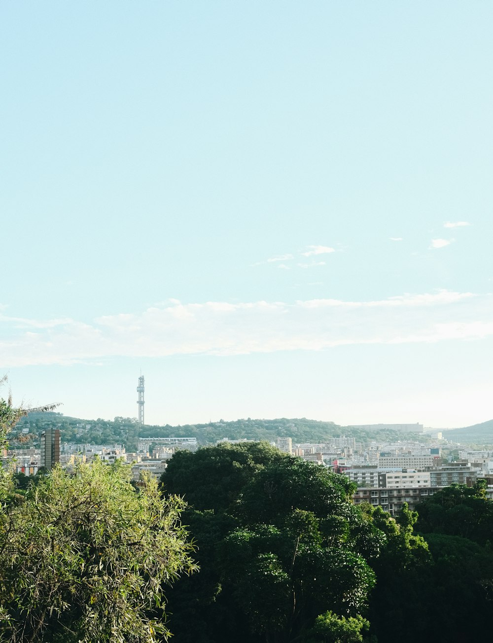 a view of a city from a hill