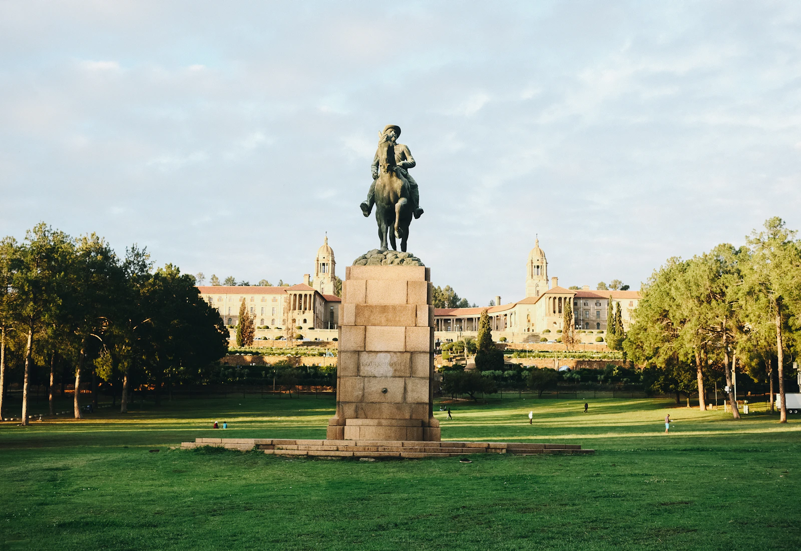 Monumental equestrian statue in a Pretoria park — the institutional weight of public service