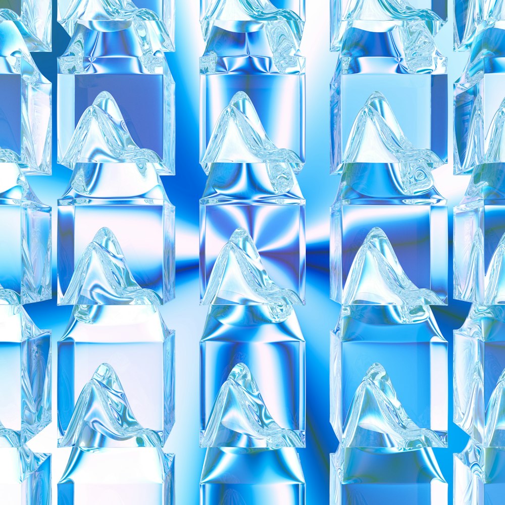 a blue and white background with many ice cubes