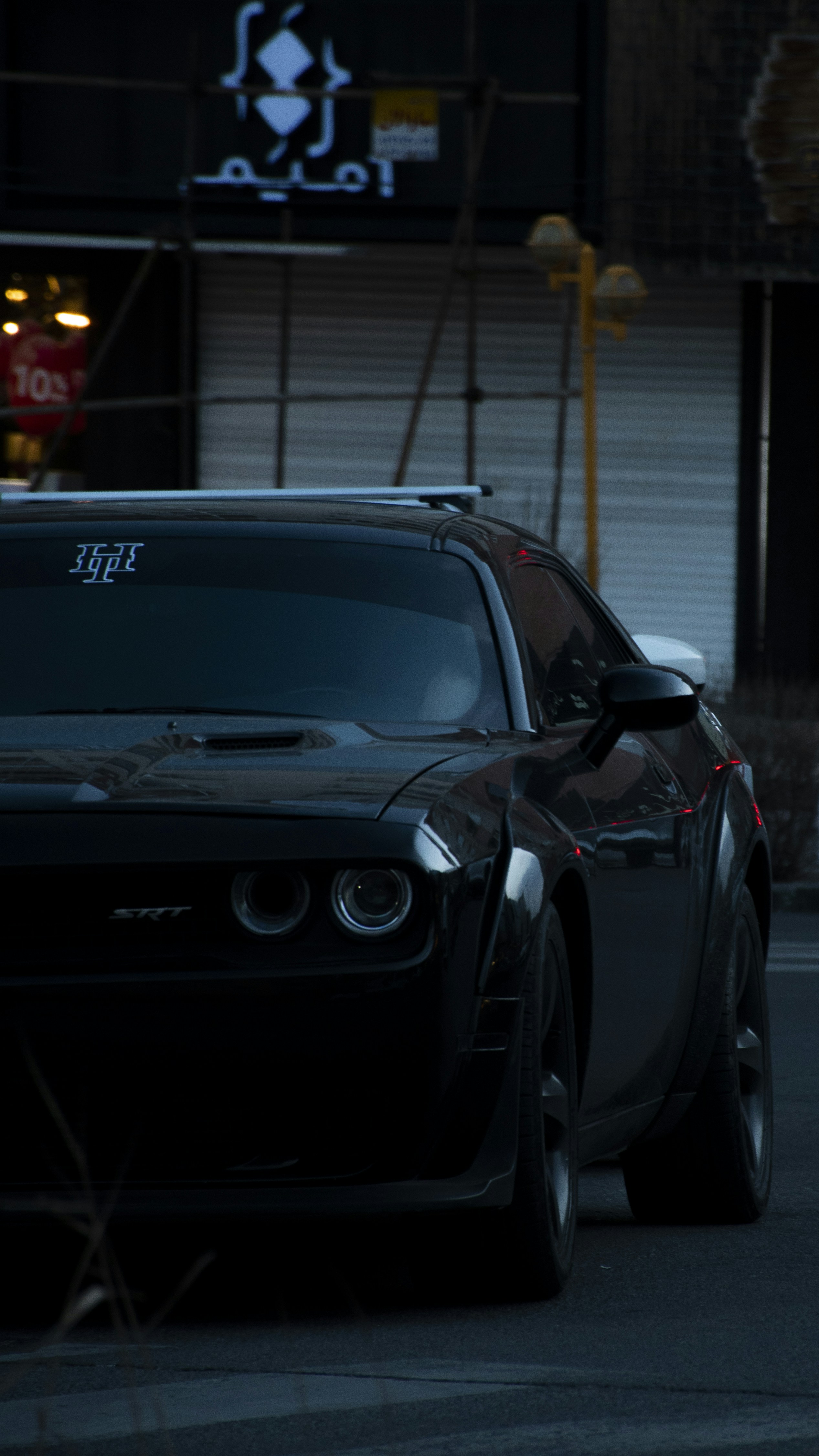matte black car, Dodge Charger, sleek muscle car, powerful vehicle, ilustrasi artikel Rev Up Your Screen: Stunning Matte Black Dodge Charger Hellcat Wallpapers 5