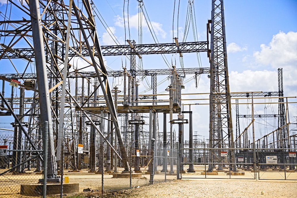 a bunch of power lines that are in the dirt