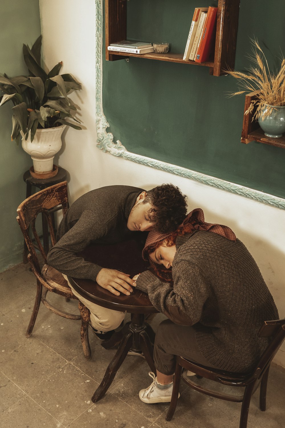 a man and a woman sitting in a chair