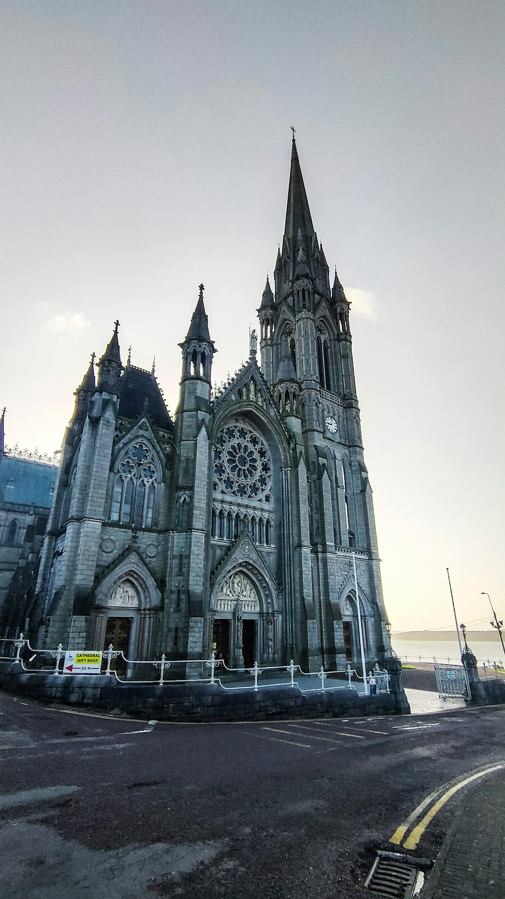 a large church with a steeple and a clock tower