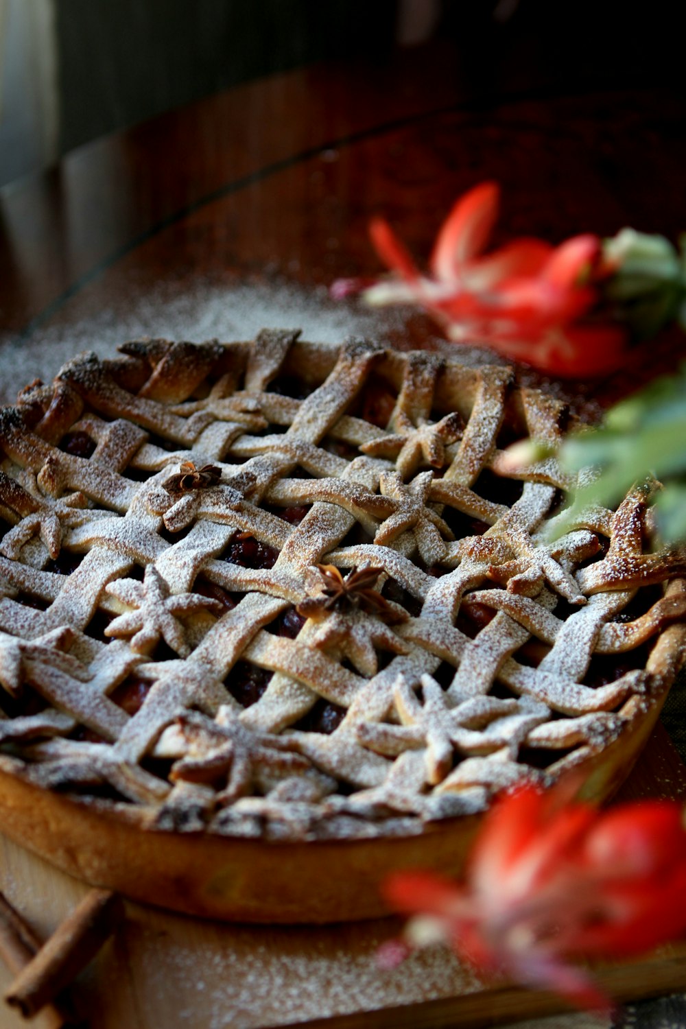 a pie sitting on top of a wooden cutting board
