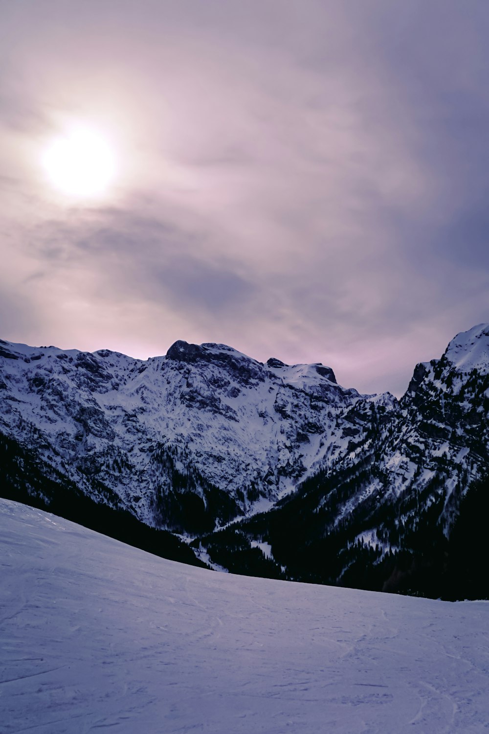 a person skiing down a snow covered mountain