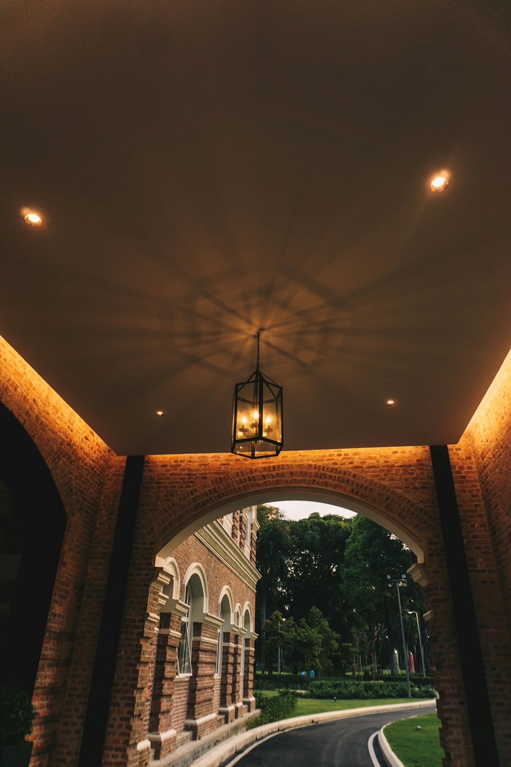 a light hanging from the ceiling of a building