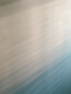 Cozy home essentials in soft grey and blue tones, inviting a sense of calm and comfort.