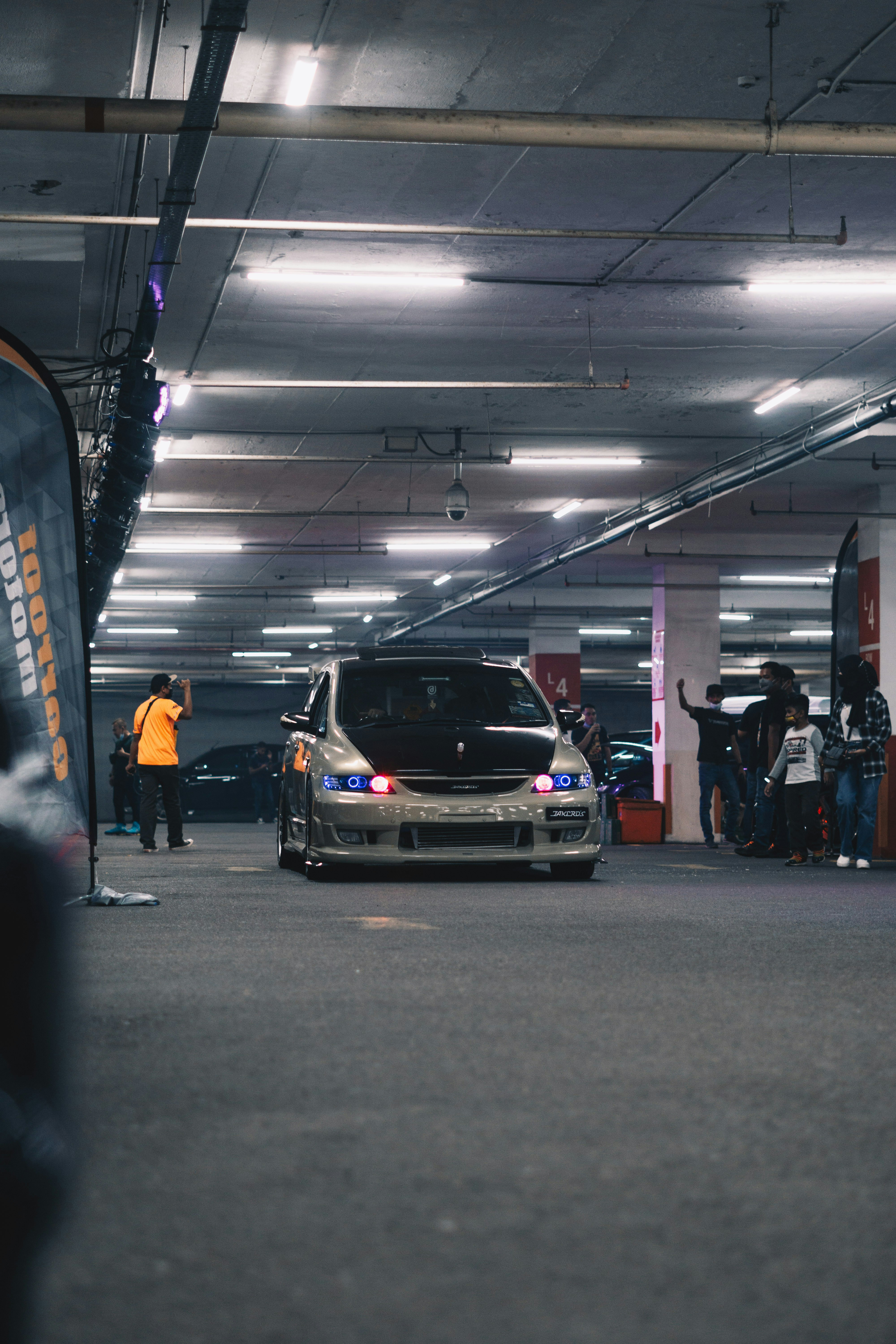 a car is parked in a parking garage