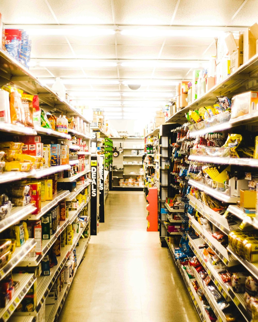 a grocery store aisle filled with lots of food