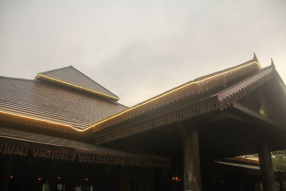 the roof of a building with a sky in the background