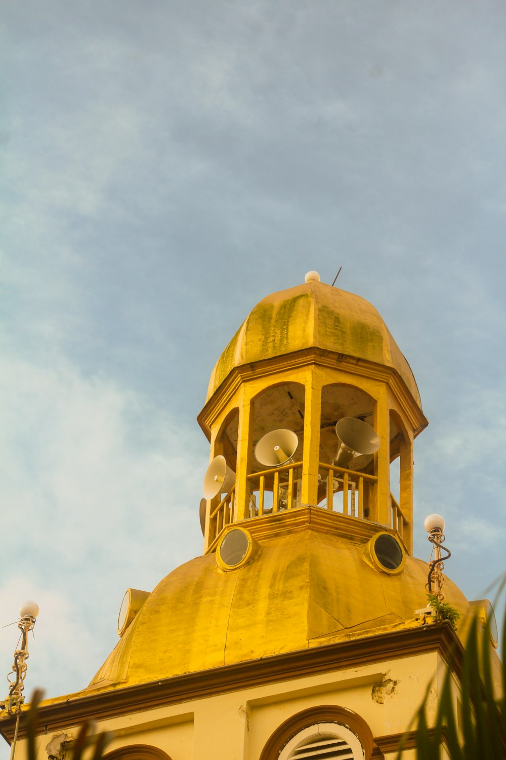 a yellow dome on top of a building