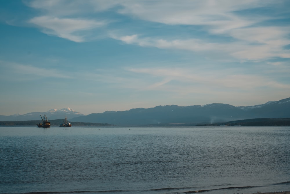 a large body of water surrounded by mountains